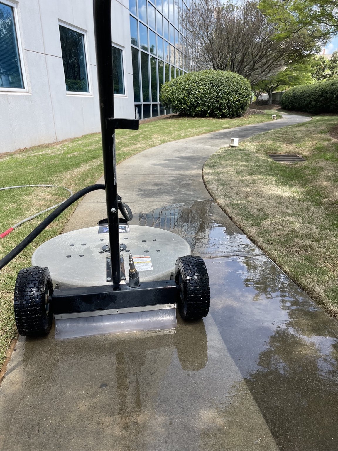 Commercial sidewalk pressure washing