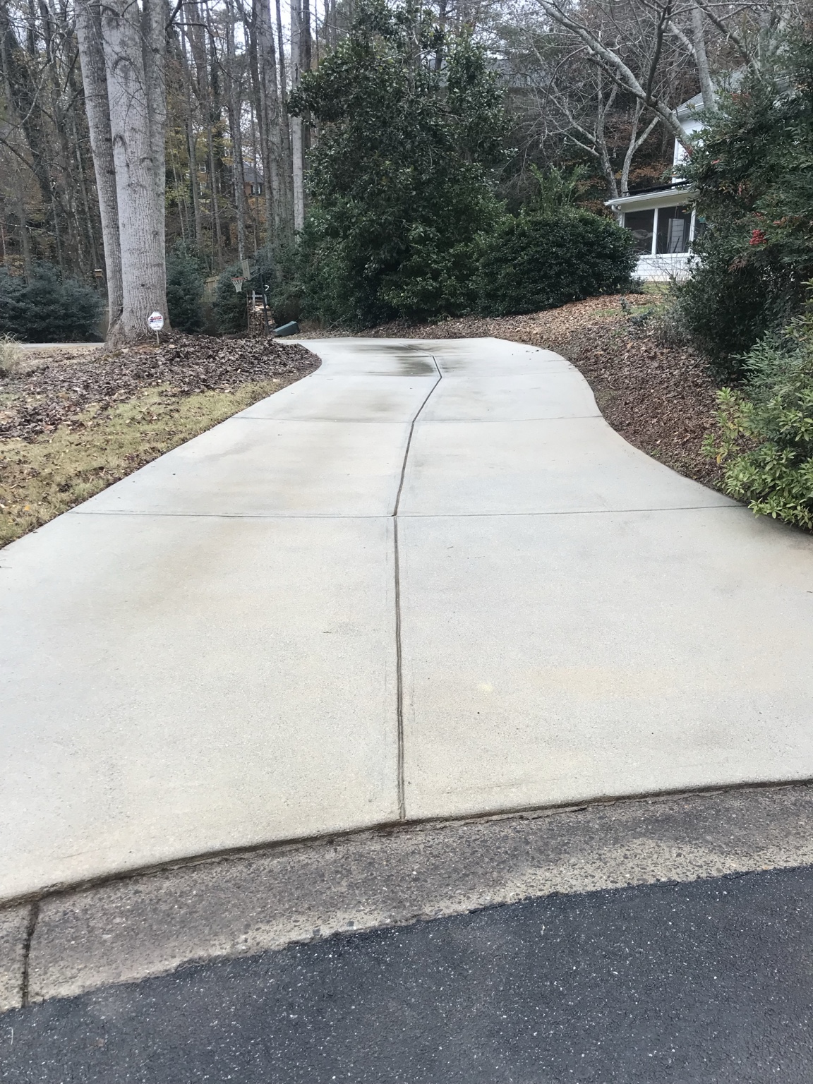 Driveway after pressure washing, clean and bright