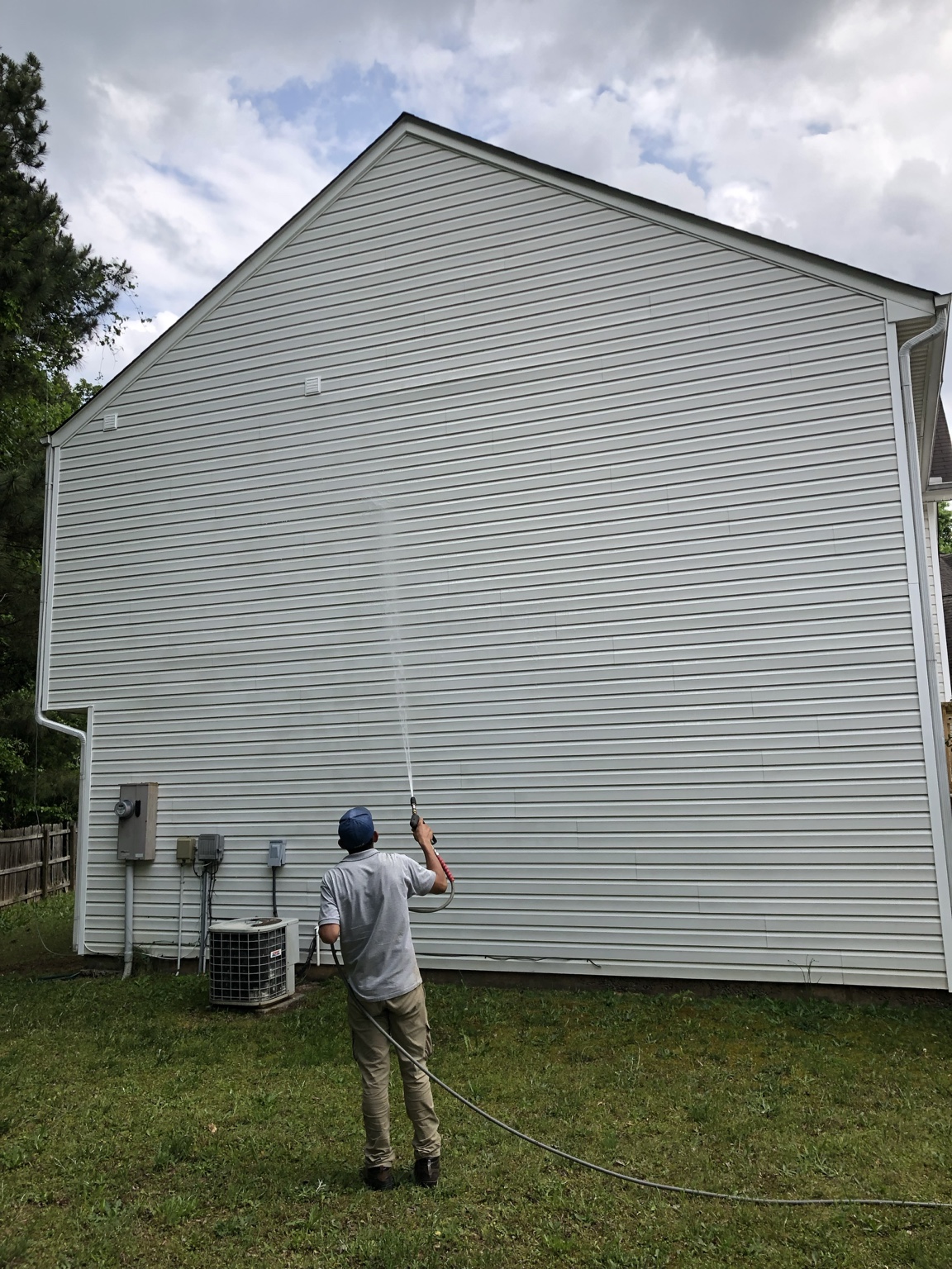 House washing after — clean white siding