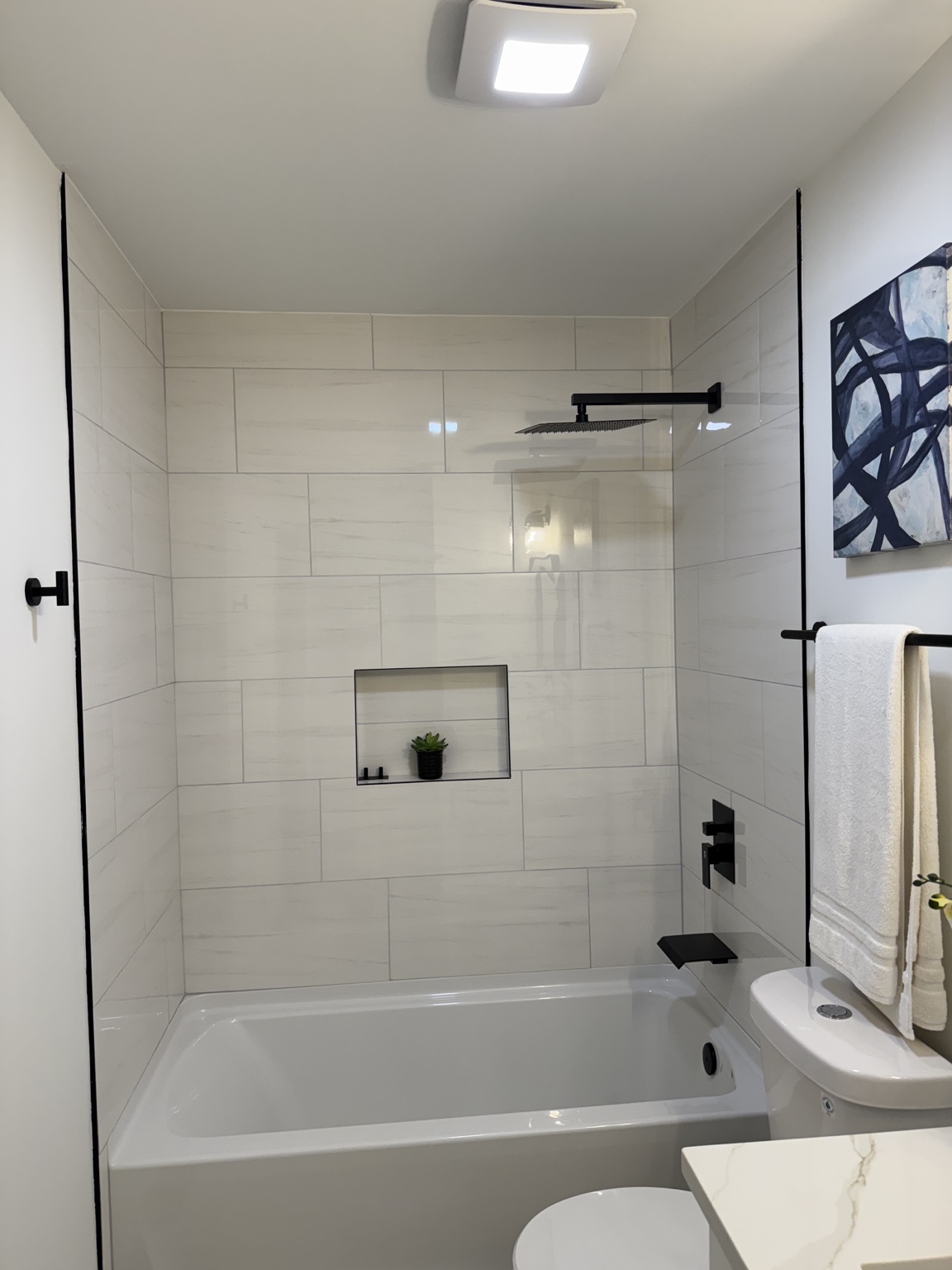 Modern bathroom with black fixtures